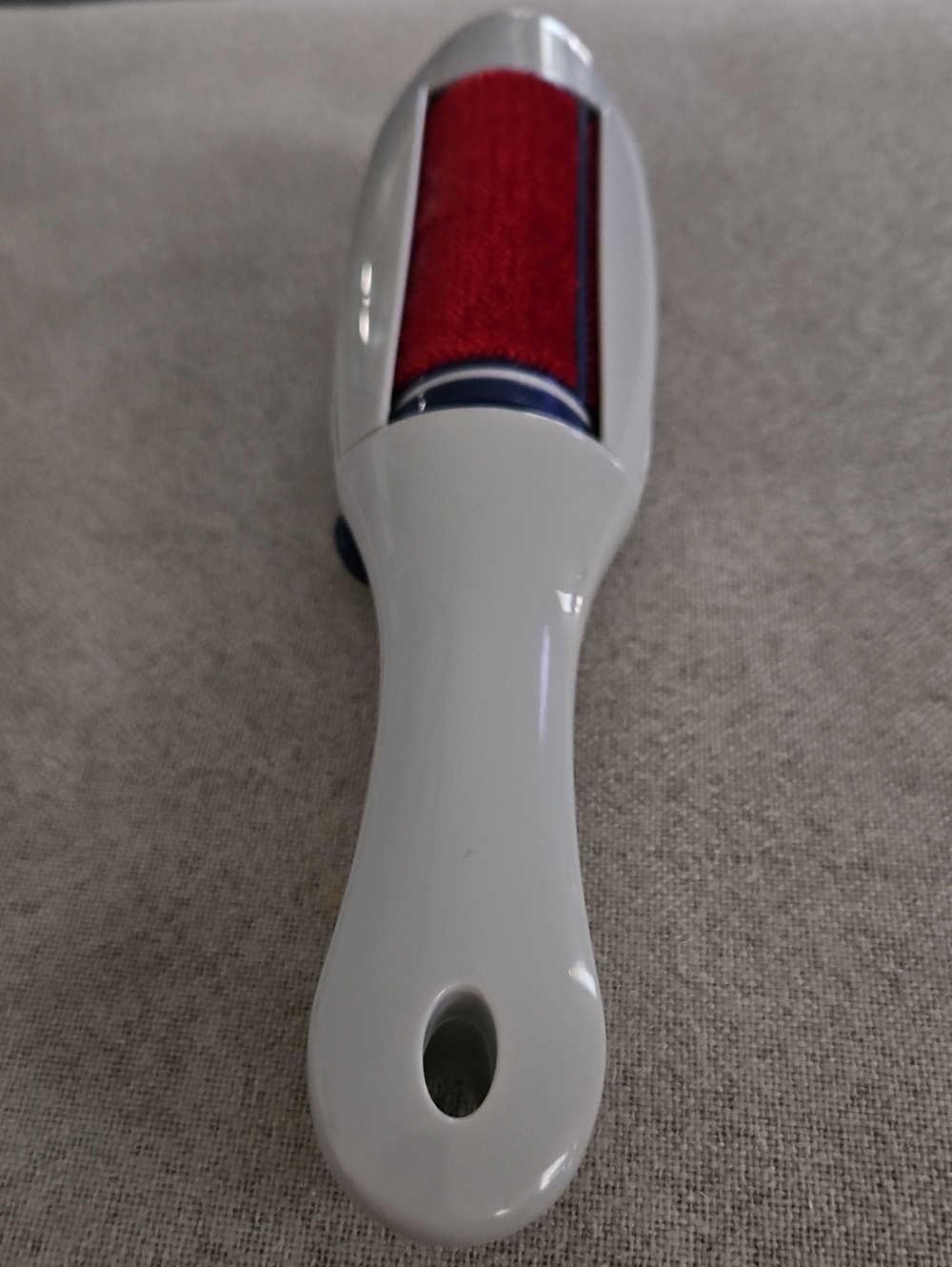 White & Red Fabric Lint Remover